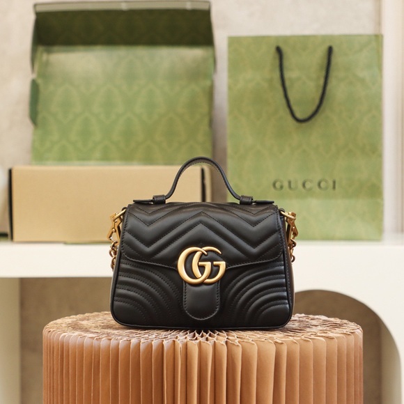 Gucci Black Quilted Women's Bag with Gold GG Logo - Picture 1 of 9